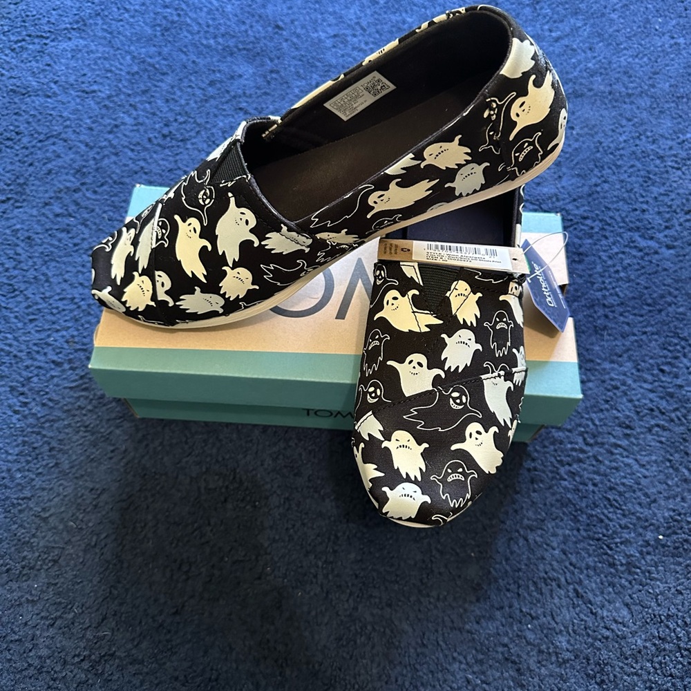 TOMS Black and White Ghost Pattern Slip-Ons
